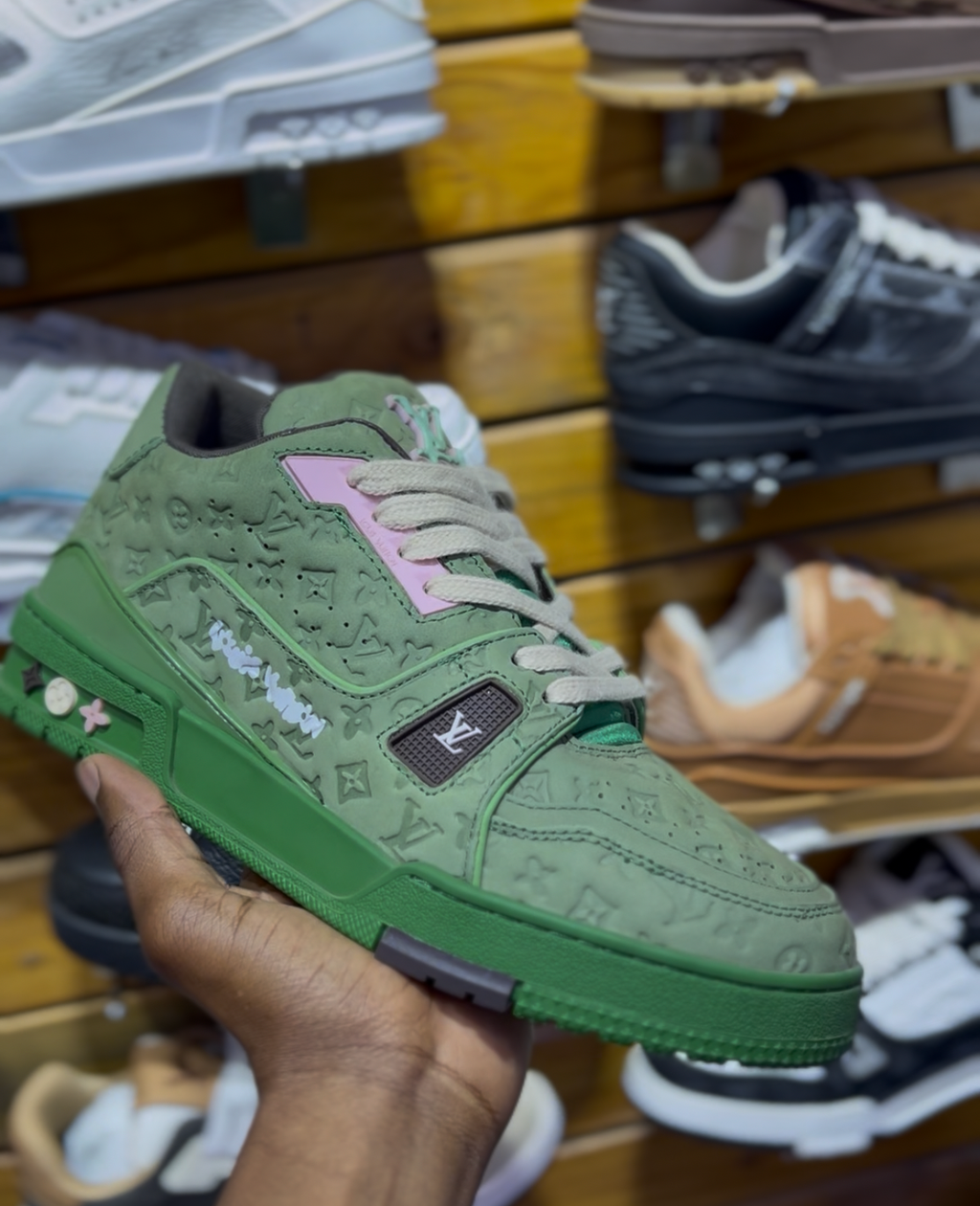 #54 LV trainer “green monogram”